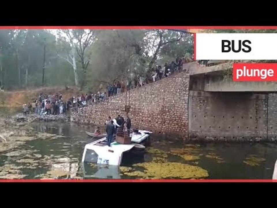 Passengers lifted to safety by crane after bus falls into open drain | SWNS TV