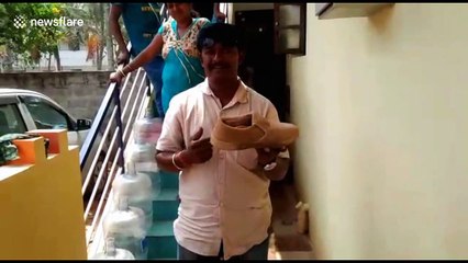 Watch your step! Man finds 5-foot-long snake hiding in his shoe