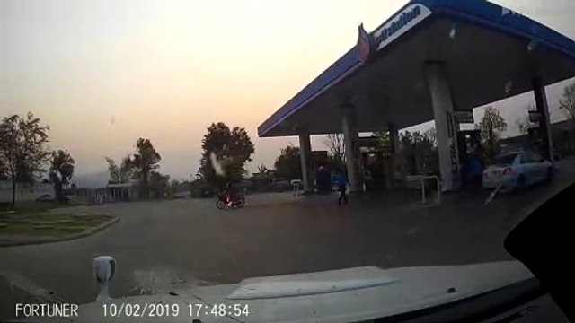 Motorcycle Catches Fire At Gas Station