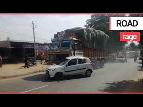 Shocking video shows truck driver PUSHING a car attached to the bonnet for 2km | SWNS TV