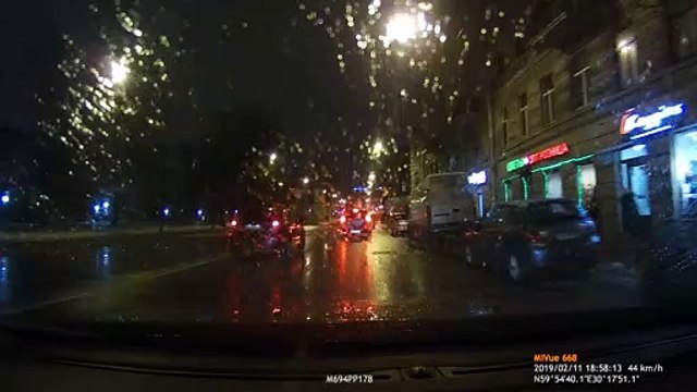 Ice From Roof Falls Onto Walking Pedestrians