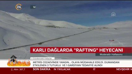 Karlı dağlarda rafting heyecanı