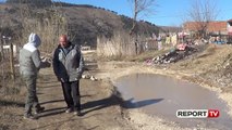 Report Tv - Asnjë investim në rrugët e Beratit/ Qytetarët: Jetojmë mes baltës dhe ujit