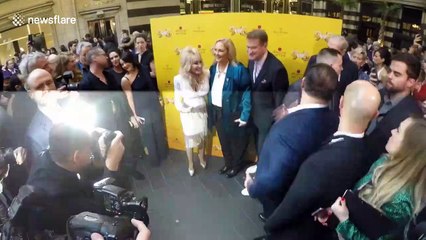 Embarrassing moment man appears to touch Dolly Parton's breast at '9 To 5: The Musical' gala night