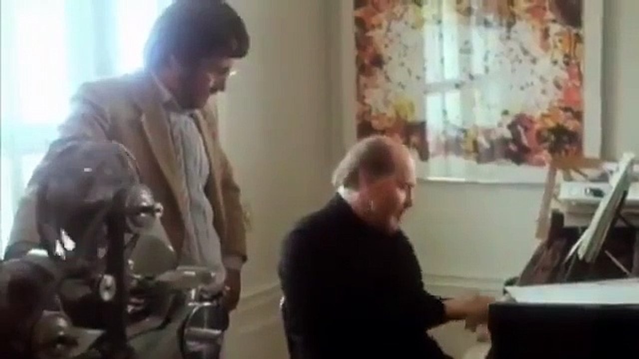 Steven Spielberg and John Williams composing the score for E.T.