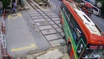 Bus Smashes Into Rail Crossing Barrier