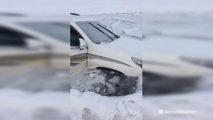 Scary moment shows ice crack as couple drives on frozen lake