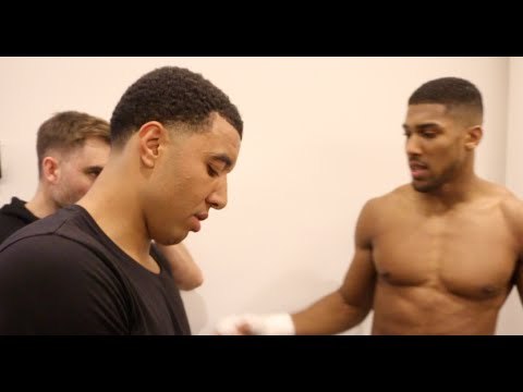 *UNSEEN* - ANTHONY JOSHUA IS CONGRATULATED BY WATFORD'S TROY DEENEY AFTER IBF WORLD TITLE WIN @ O2