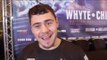 DAVE ALLEN REACTS DERECK CHISORA THROWING A TABLE AT DILLIAN WHYTE DURING PRESS CONFERENCE