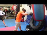 REECE BELLOTTI SMASHES THE HEAVY BAG AS HE PREPARES FOR IAN BAILEY IN YORKHALL DUST UP
