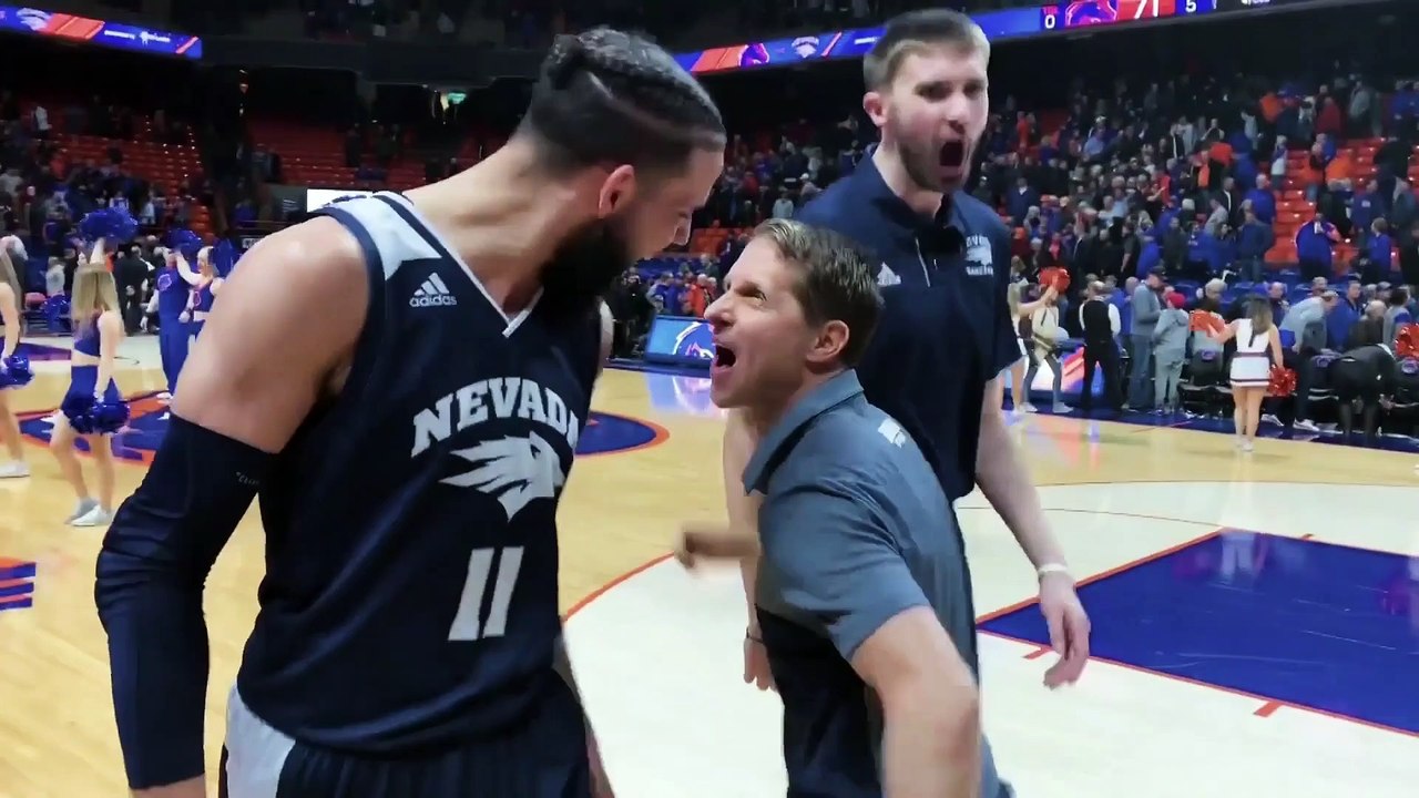 Eric Musselman and His Wife Watch Their Daughter Play Basketball