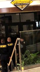 Security Guard Strikes Man