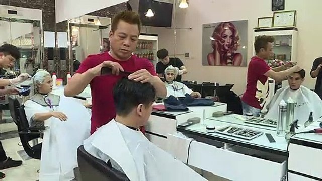 Les coupes de cheveux Trump et Kim , succès au Vietnam