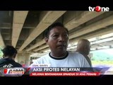 Aksi Protes Nelayan di Atas Perahu Motor