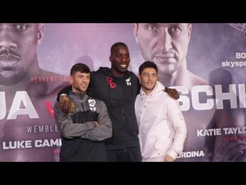 HE'S ALWAYS IN THE MIDDLE!! LAWRENCE OKOLIE TOWERS OVER