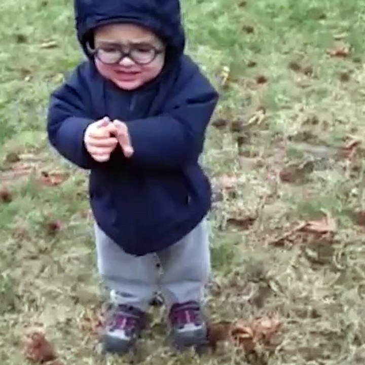 Laughing video of lovely baby playing with ice in winter, awesome..
