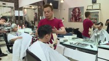 Hair apparent: Hanoi barber offers free Trump and Kim cuts ahead of summit