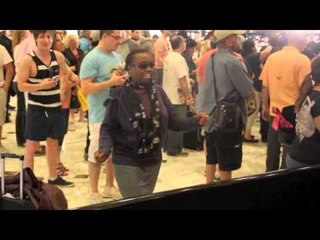CRAZY WOMAN HAVING IT LARGE IN THE MGM GRAND LOBBY IN LAS VEGAS.