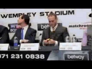 GEORGE GROVES PLAYS HIS 'RUBIK'S CUBE' DURING THE PRESS CONFERENCE (EXCLUSIVE) FROCH v GROVES 2