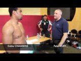 EDDIE CHAMBERS RECEIVING LAST MINUTE INSTRUCTIONS FROM PETER FURY BEFORE CARL BAKER FIGHT