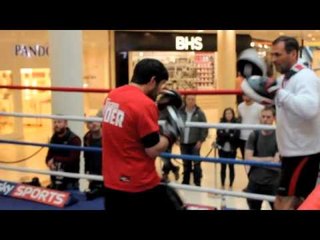 JOHN RYDER HITS THE PADS WITH TRAINER TONY SIMS IN WATFORD PUBLIC WORKOUT