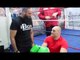 TYSON FURY IS PRESENTED WITH iBOX CUSTOM GLOVES BY COACH IMRAN WITH PETER FURY / iFL TV