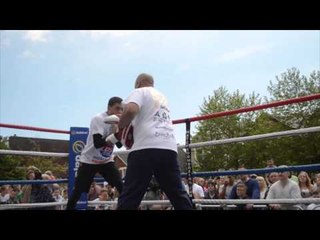 LEE SELBY DEMONSTRATES TO THE CROWD HIS HAND SPEED & FOOTWORK WITH TRAINER TONY BORG