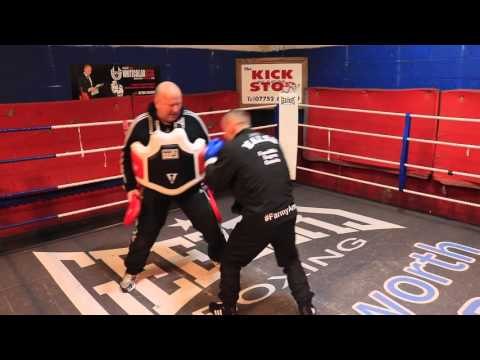 BRITISH CHAMPION RYAN WALSH WORKING ON THE PADBATS & BODY BELT WITH TRAINER GRAHAM EVERETT