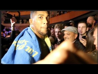 ANTHONY JOSHUA NEARLY BREAKS KUGAN CASSIUS' CAMERA WITH PUNCH - AS HE MAKES TIME FOR FANS IN WALES!