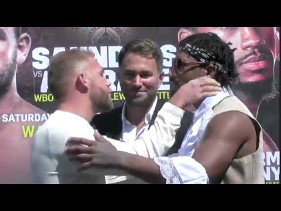 EDDIE HEARN WATCHES AS BILLY JOE SAUNDERS & DEMETRIUS ANDRADE EXCHANGE WORDS & THEN BIZARRELY HUG