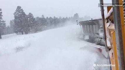 This is what it looks like to plow snow on a highway
