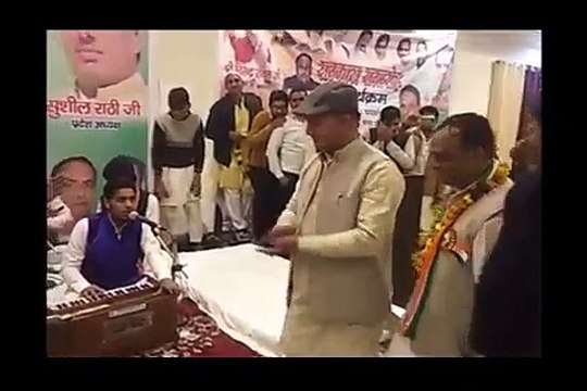 Congress party workers shower currency notes on Congress leader Virendra Rawat at tribute ceremony in Roorkee organised by the Party for the CRPF soldiers who lost their life in Pulwama terrorist attack