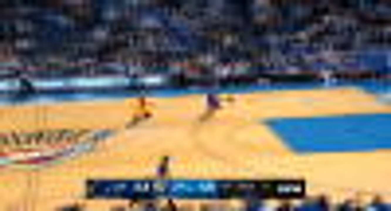 George throws down windmill dunk