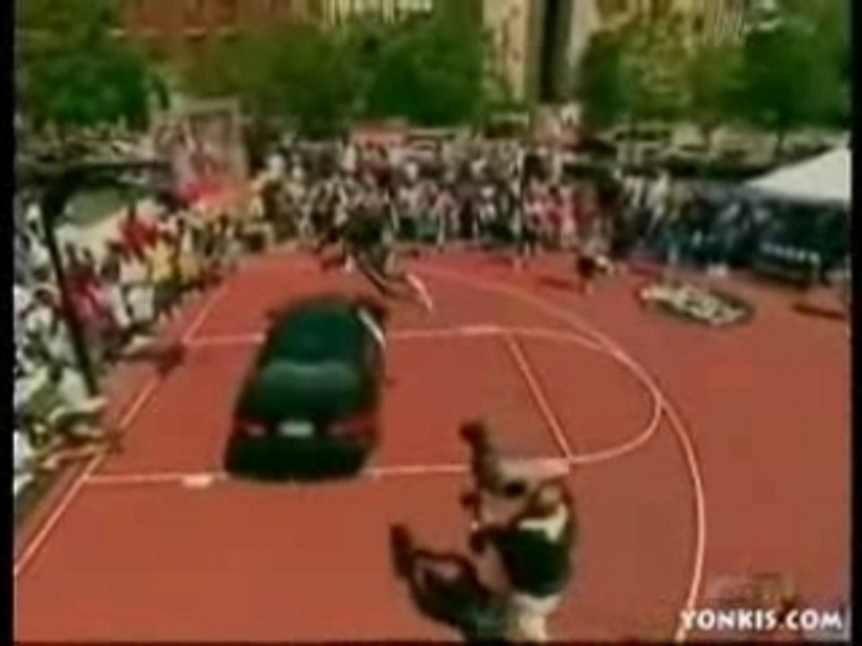 Monster dunk over a car!