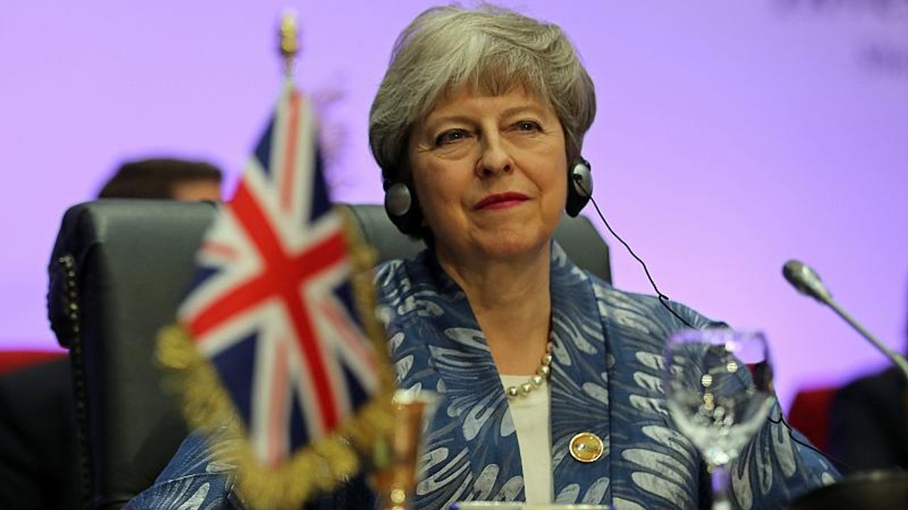 Theresa May goes from Dancing Queen to pool shark with Italy's Conte