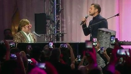 Elton John performs ‘Tiny Dancer’ with Taron Egerton