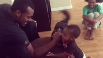 Baby Beats Dad in Arm Wrestling
