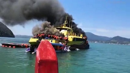 Tourists Rescued From Burning Boat