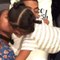 Little Girl Gives Parents Head-Butting Kisses