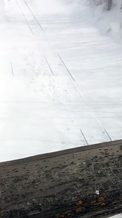 Train Travels Through Massive Snow Drift