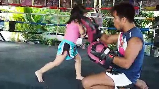 Five-Year-Old Muay Thai Girl Working Pads