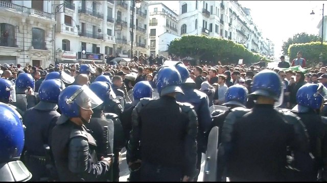 Algeria protests: Students rally against president
