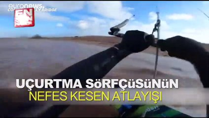 Uçurtma sörfçüsünün nefes kesen atlayışı