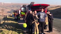 Fire crews attend scorched earth near Saddleworth Moor