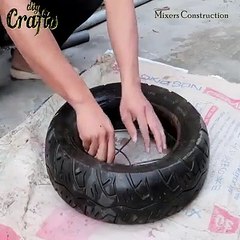 creative construction gym barbell using old tires and cement