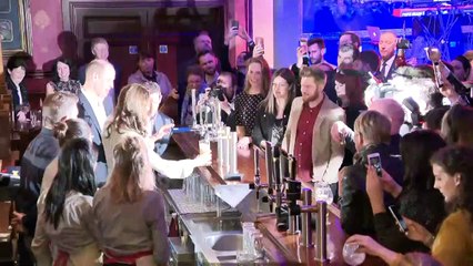 Duke and Duchess of Cambridge pull pints in Belfast