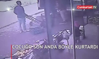 Çocuğu otomobilin altında kalmaktan son anda kurtardı