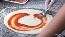 The 'Pizza Pocket Hoodie' Keeps Slices Close to Your Heart Without the Mess