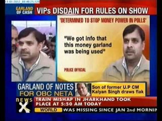 Ex-UP CM Kalyan Singh's son Rajveer gifted garland of notes.flv