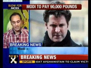 Modi loses libel case, has to pay £90,000 to Cairns - NewsX